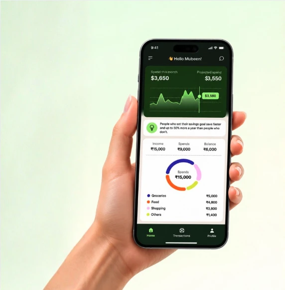 Hand holding a phone showing the PayTrack home screen